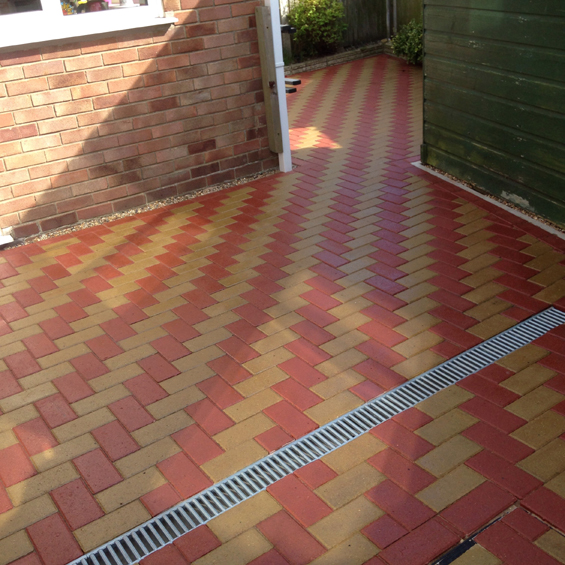 Red and buff patio sealed with Resiblock